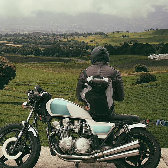 rider enjoying the landscape with their motorcycle