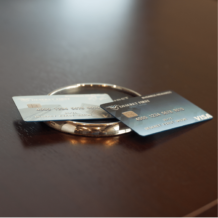 close up of a set of business credit cards laid out on a desk