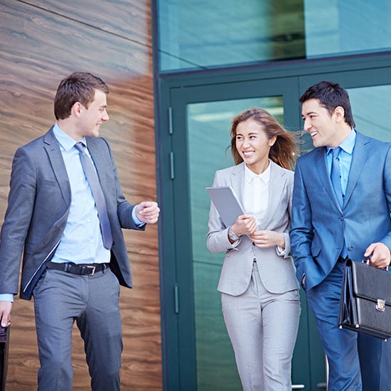 group of business partners chatting outside