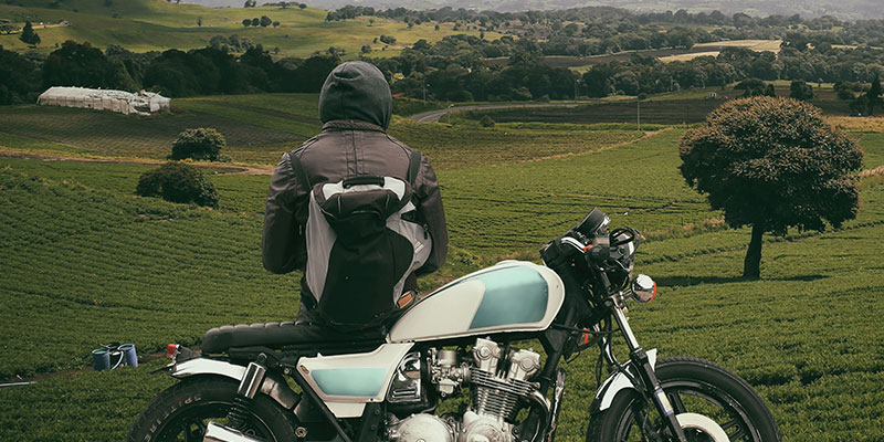 rider enjoying the landscape with their motorcycle