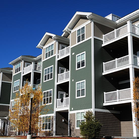 exterior photo of a 4 story apartment building