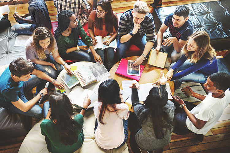 large group of students studying together