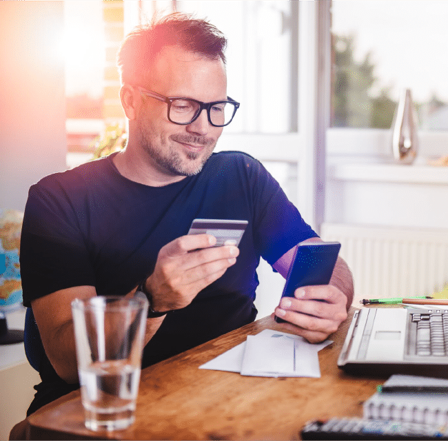 Man learning about his credit card