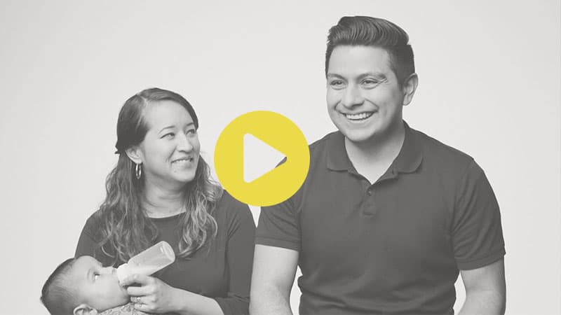 Image of the De Hoyos family with a play button overlay