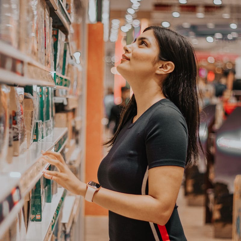 woman looking at store products