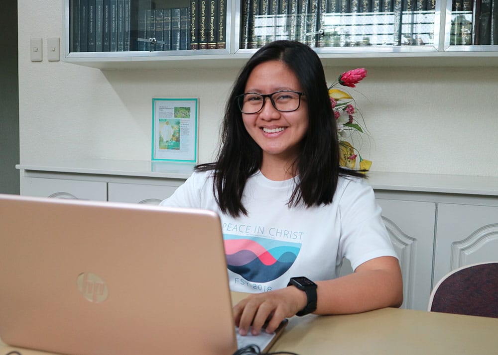 A returned sister missionary attending online university.