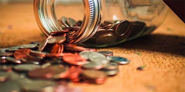 Spare change in a mason jar