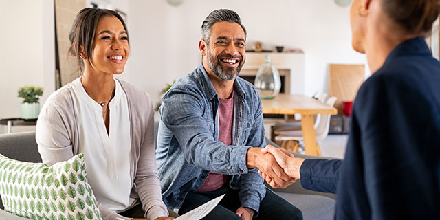 A couple meeting with a lender